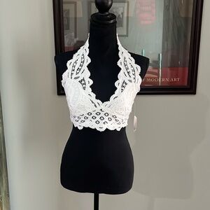 Free People white cotton / Lycra lace brocade halter top . Size large